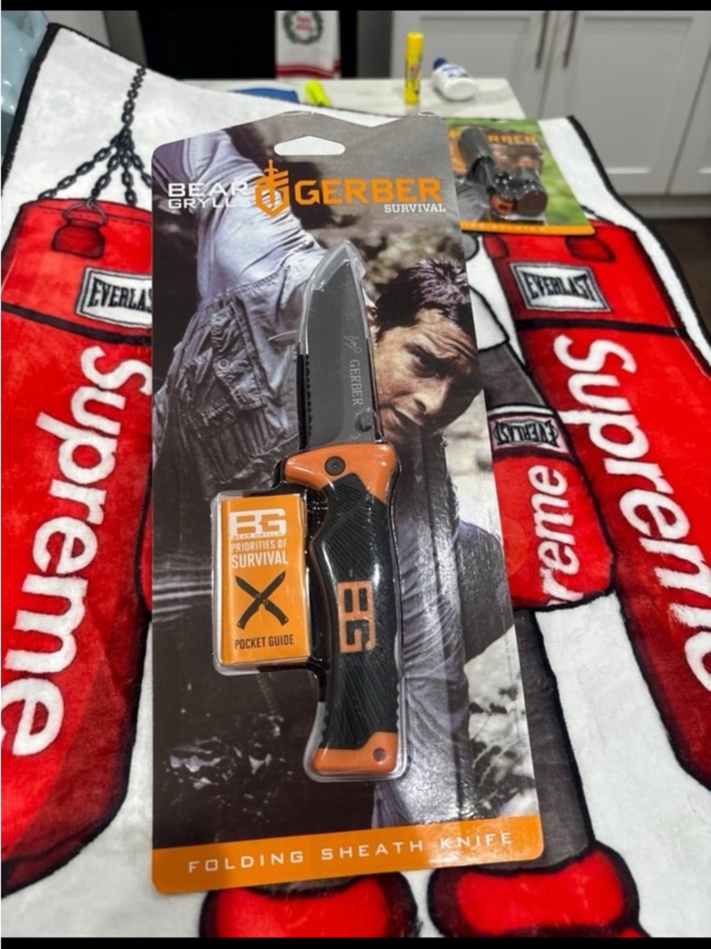 Gerber Black & Orange Folding Survival Knife with BG Pocket Guide